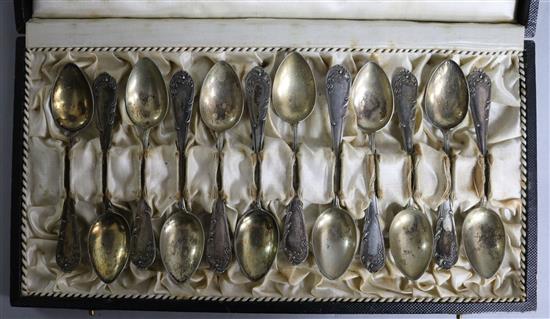 A cased set of twelve late 19th/early 20th century German silver coffee spoons.